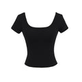 Fitness yoga wearing short sleeved T-shirt.