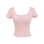 Fitness yoga wearing short sleeved T-shirt.